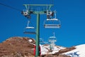 Chairlift and mountain with nice blue sky Royalty Free Stock Photo