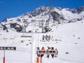 Chairlift in mountains under snow Royalty Free Stock Photo