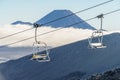 Chairlift on rocky mountain with volcano on background, Mount Ngauruhoe, Tongariro National Park, New Zealand Royalty Free Stock Photo