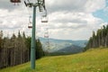 Chairlift ski lift in European Alps. Royalty Free Stock Photo