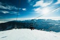 Chairlift for skiers on a rope Royalty Free Stock Photo