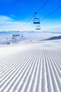 Chairlift for skiers on a rope Royalty Free Stock Photo