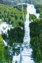 Chairlift for skiers on a rope Royalty Free Stock Photo