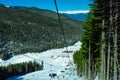 Chairlift for skiers on a rope Royalty Free Stock Photo