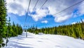 On the Chairlift during Spring Skiing at Sun Peaks Royalty Free Stock Photo