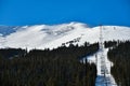 Chairlift  to peak 6 on snowy hill at Breckenridge Ski resort Royalty Free Stock Photo