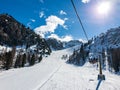 Chairlift `Vitelli`, going to the top of the `Canalone Franchetti` slope on mount Faloria in Cortina d`Ampezzo, Dolomites, It Royalty Free Stock Photo