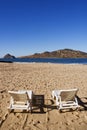 Chairs on the Beach Face Deer Island in Mazatlan Mexico