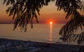 Chairs on a beach at sunset on Lake Ontario. Royalty Free Stock Photo