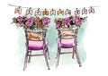 Chairs for the bride and groom. Flowers and wedding accessories