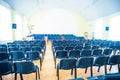 Chairs in the empty room for performances