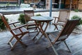 Comfortable chairs for relaxing in the illuminated gazebo in the backyard