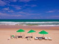 Chairs and green umbrella Royalty Free Stock Photo