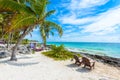 Chairs and Hammock under the palm trees on paradise beach at tropical Resort. Riviera Maya - Caribbean coast at Tulum in Quintana Royalty Free Stock Photo