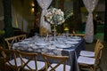 Romantic party table setting, elegant ballroom for wedding reception, decoration ideas, flowers centerpiece Royalty Free Stock Photo