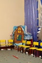 Chairs near the wall. Beautiful New Year's interior in the kindergarten. Royalty Free Stock Photo