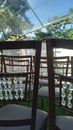 Chairs and an outdoor wedding altar on a beautiful sunny afternoon Royalty Free Stock Photo