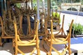 Chairs stacked outside of a traditional restaurant