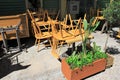 Chairs stacked outside of a traditional restaurant in the touristic district of Monastiraki
