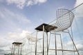 Chairs and Stools Bar with Blue Sky for nature background. Royalty Free Stock Photo