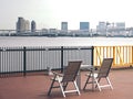 Chairs and Sumida River and Odaiba view