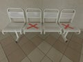 Chairs symbol covid-19 distancing no people