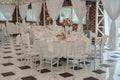 Chairs and table decorated with flowers. Special wedding concept