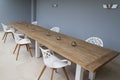 Chairs at a table with gaps for social distancing Royalty Free Stock Photo
