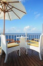 Chairs, table and umbrella