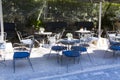 Chairs and tables arranged in a tavern from Athens