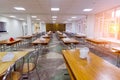 Chairs and tables. The dining hall in school is quarantined, isolation. Royalty Free Stock Photo