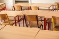 Chairs and tables inside empty classroom in primary school Royalty Free Stock Photo