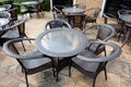 Chairs and tables of a restaurant seating outside Royalty Free Stock Photo