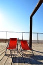 Chairs on terrace Figueira da Foz Beach Royalty Free Stock Photo