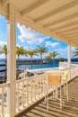 Chairs on terrace in Puerto Calero marina Royalty Free Stock Photo