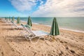 Chairs and umbrella on the beach of Hollywood, Florida. Royalty Free Stock Photo