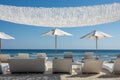 Chairs and umbrella on a beach near the sea