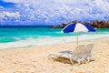 Chairs and umbrella at tropical beach Royalty Free Stock Photo