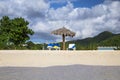 Chairs and umbrella at a tropical beach Royalty Free Stock Photo