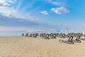 Chairs and umbrellas on a beautiful beach at sunrise in Sunny Beach on the Black Sea coast of Bulgaria Royalty Free Stock Photo