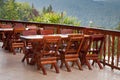 Chairs and wooden table in a terrace Royalty Free Stock Photo