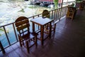 Chairs with wooden table on the terrace Royalty Free Stock Photo