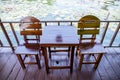 Chairs with wooden table on the terrace Royalty Free Stock Photo