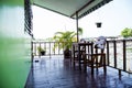 Chairs with wooden table on the terrace Royalty Free Stock Photo