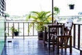 Chairs with wooden table on the terrace Royalty Free Stock Photo