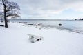 Chaise longue on the snowed beach Royalty Free Stock Photo