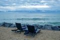 Chaise Lounges on Chilly October Beach Morning at Michigan`s Lake Huron