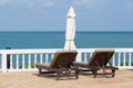 Chaise lounges by the sea in Thailand Royalty Free Stock Photo