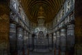 Chaitya interior showing standing Buddha figure over the stupa. Ajanta Caves, Aurangabad, Maharashtra