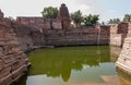 Chakra Gudi temple and its tank at water level  Aihole  Karnataka  India Royalty Free Stock Photo
